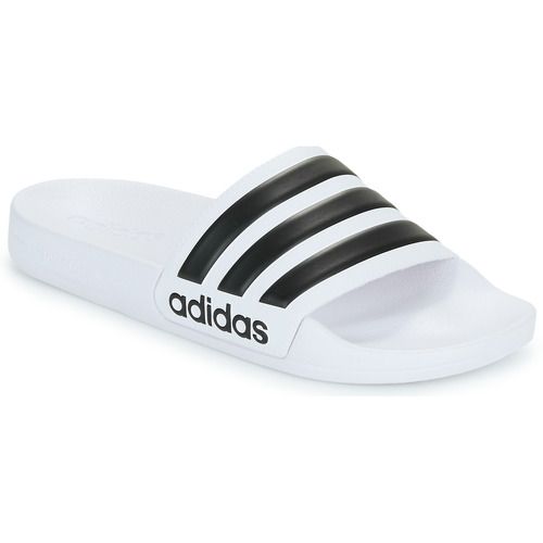 Ciabatte adidas ADILETTE SHOWER Bianco per donna, perfette per il comfort e lo stile quotidiano. Design elegante e versatile, ideali per la piscina, il mare o il relax a casa. Scarpe estive di alta qualità, che uniscono praticità e moda. Scegli il comfort con adidas ADILETTE SHOWER.