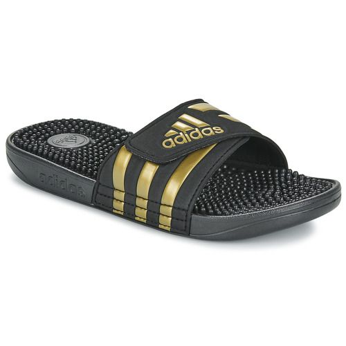 Ciabatte Adidas ADISSAGE nere da donna, comode e stilose, perfette per l'estate. Ideali per il tempo libero e per la spiaggia, offrono un design moderno e un comfort eccellente. Acquista ora le ciabatte Adidas ADISSAGE per un look trendy e relax assicurato.