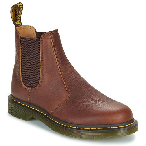 Stivaletti Donna Dr. Martens 2976 CASHEW AMBASADOR in marrone, eleganti e versatili, perfetti per ogni occasione. Realizzati in pelle di alta qualità, questi stivaletti presentano un design classico con elastici laterali per una vestibilità comoda. Ideali per completare il tuo look autunnale e invernale, assicurano comfort e stile duraturo. Perfetti per chi cerca unire moda e funzionalità.