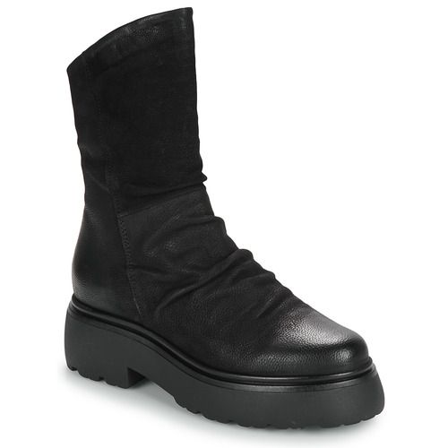 Stivaletti Donna Mjus ORTISEI in color nero, realizzati in pelle di alta qualità. Design elegante e alla moda, ideali per ogni occasione. Sottopiede confortevole e suola antiscivolo per una camminata sicura. Perfetti per completare il tuo outfit con stile. Acquista ora i Mjus ORTISEI per un look trendy e sofisticato.
