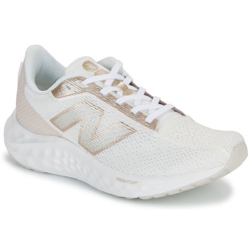 Scarpe da running Donna New Balance ARISHI Beige, eleganti e leggere, ideali per il fitness e il tempo libero. Comfort superior e design moderno per ogni passo.