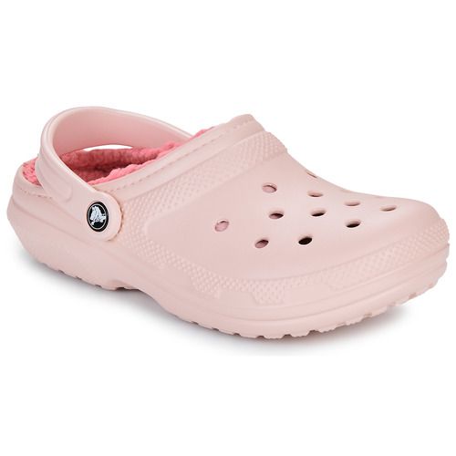 Zoccoli donna Crocs Classic Lined Clog rosa, comodi e stilosi, perfetti per la stagione estiva. Realizzati con materiali di alta qualità, questi zoccoli offrono comfort e supporto per l'uso quotidiano. Ideali per il tempo libero, il giardino o la spiaggia, aggiungono un tocco di eleganza al tuo look estivo. Disponibili in rosa, sono un must-have per ogni amante della moda casual.