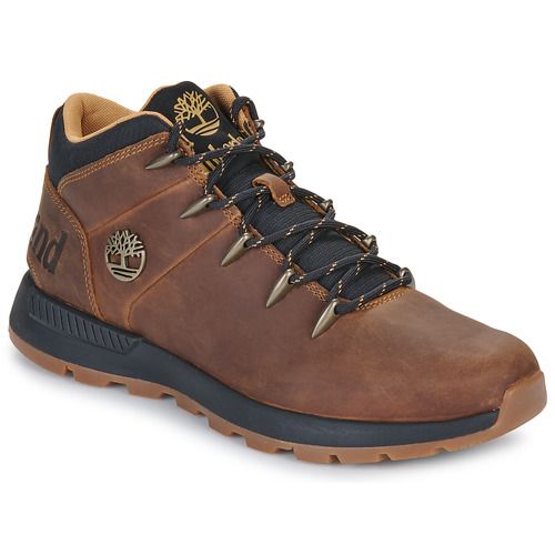 Sneakers alte uomo Timberland SPRINT TREKKER MID LACE UP in marrone, perfette per l'escursionismo e l'outdoor. Design robusto e confortevole, suola antiscivolo per una migliore aderenza. Ideali per avventure all'aperto e uso quotidiano. Acquista ora le Timberland SPRINT TREKKER MID LACE UP marrone per un look elegante e funzionale.