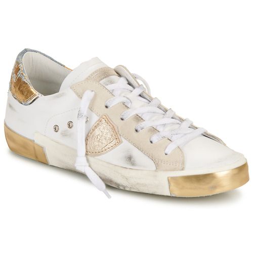 Sneakers basse Philippe Model PRSX LOW WOMAN in Bianco, eleganti e versatili, ideali per un look casual e alla moda. Design moderno con dettagli raffinati, perfette per le donne che cercano comfort e stile. Acquista ora le Philippe Model PRSX LOW WOMAN per un tocco chic al tuo outfit quotidiano.