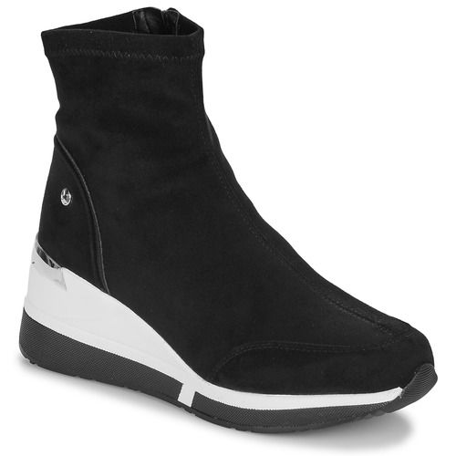 Sneakers alte Xti 142645-BLACK nere da donna, eleganti e versatili, perfette per ogni occasione. Design moderno e dettagli di qualità, ideali per un look alla moda. Acquista le tue sneakers alte Xti e completa il tuo outfit con stile.