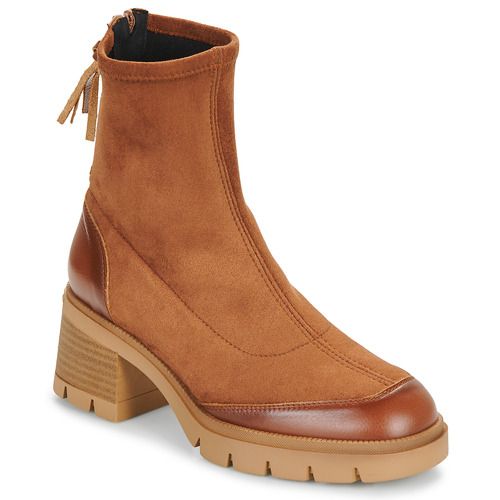 Stivaletti Hispanitas EVEREST Marrone Donna: eleganti e versatili, realizzati in pelle di alta qualità, ideali per ogni occasione. Comfort e stile uniti in un design raffinato. Perfetti per completare il tuo look autunnale.