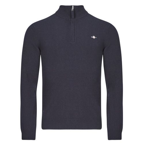 Felpa uomo Gant SUPERFINE LAMBSWOOL HALF ZIP in colore marine, realizzata in pregiata lana d'agnello super fine, ideale per un look elegante e casual. Perfetta per la stagione autunnale/invernale, offre comfort e stile. Acquista ora la felpa Gant per elevare il tuo guardaroba!