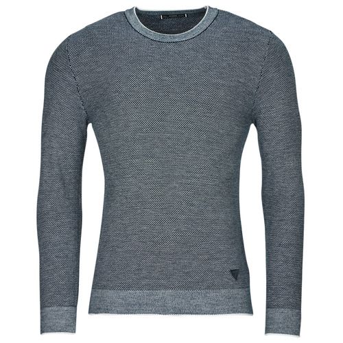 Maglione Uomo Guess EARLE LS STICHED SWEATER Blu, elegante e confortevole, realizzato in tessuto di alta qualità, perfetto per un look casual e alla moda. Questo maglione è ideale per le stagioni fresche, facilmente abbinabile a jeans e pantaloni. Aggiungi un tocco di stile al tuo guardaroba con il Guess EARLE LS STICHED SWEATER Blu.