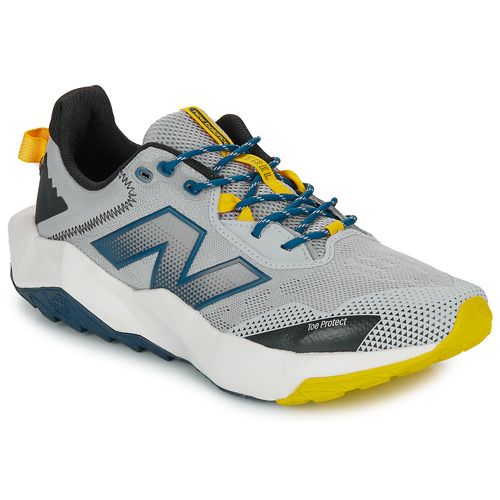 Scarpe da running Uomo New Balance NITREL Grigio, design moderno e confortevole, perfette per prestazioni sportive e uso quotidiano. Ideali per gli amanti del fitness e della corsa, offrono supporto e stile.
