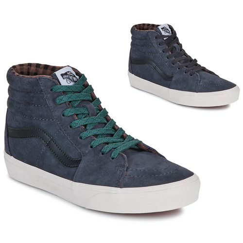 Sneakers alte Vans SK8-Hi Grigio per donna, design elegante e moderno, ideali per un look casual e alla moda. Perfette per l'uso quotidiano e per gli appassionati di skate, queste scarpe offrono comfort e stile senza tempo. Acquista ora le Vans SK8-Hi grigie e completa il tuo outfit!