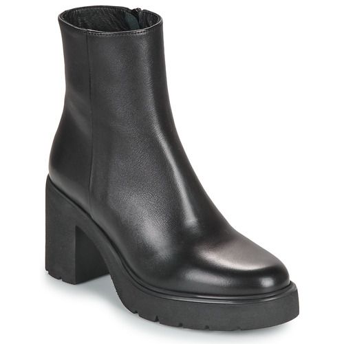 Stivaletti Unisa KHAN neri da donna, eleganti e versatili, ideali per ogni occasione. Realizzati in materiali di alta qualità, offrono comfort e stile. Perfetti da abbinare a look casual o formali, questi stivaletti sono un must-have per il guardaroba femminile. Acquista ora gli stivaletti Unisa KHAN e scegli la moda con classe!