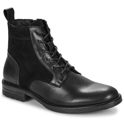 Stivaletti Uomo Carlington JAZZY in Nero, eleganti e confortevoli, ideali per un look casual e sofisticato. Perfetti per ogni occasione, questi stivali offrono stile e versatilità, rendendoli un must-have nel guardaroba maschile. Acquista ora i Carlington JAZZY Nero per un tocco di classe al tuo outfit!