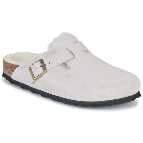 Zoccoli donna Birkenstock Boston Shearling LEVE in bianco antico, con morbido rivestimento in shearling, design elegante e comfort ottimale. Ideali per la stagione invernale, questi zoccoli offrono un perfetto equilibrio tra stile e praticità. Ottimali per outfit casual e sofisticati.
