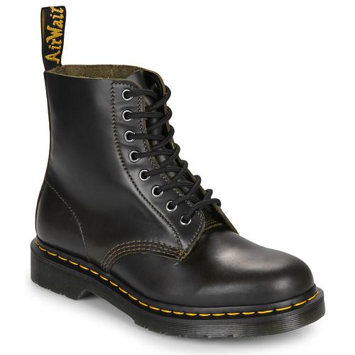 Stivaletti Donna Dr. Martens 1460 DARK TAUPE ORLÉANS in marrone, iconici stivali in pelle con sistema di ammortizzazione AirWair, suola in gomma resistente e design alla moda. Perfetti per ogni occasione, questi stivaletti combinano stile e comfort. Disponibili per acquisto online, ideali per completare il tuo look autunnale.