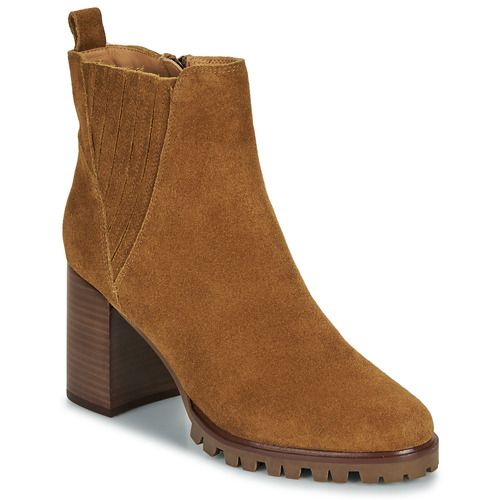 Stivaletti Karston POPPY marroni da donna, eleganti e versatili, ideali per ogni stagione. Realizzati in materiali di alta qualità, offrono comfort e stile. Sono perfetti per completare il tuo look con un tocco di classe. Acquista online e risalta la tua personalità con questi stivaletti di tendenza!