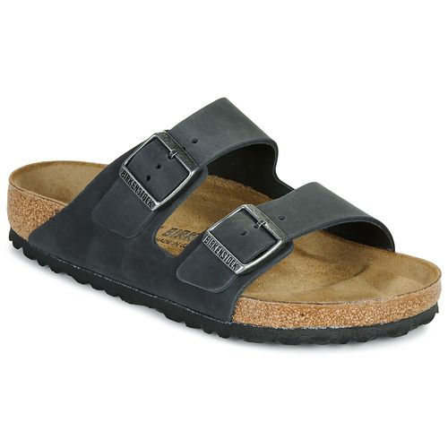Ciabatta donna Birkenstock Arizona LEOI Black Nero, elegante e comoda, in pelle di alta qualità con plantare ergonomico per un comfort ottimale. Perfetta per un look casual e versatile, ideale per ogni stagione. Acquista ora la tua Birkenstock Arizona LEOI per un tacco di stile e comodità.