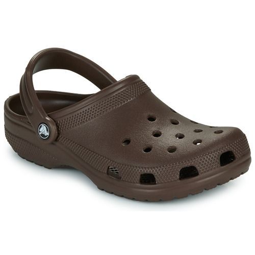 "Crocs Classic Zoccoli Donna in colorazione versatile, ideali per comfort e stile quotidiano. Perfetti per l'uso in casa, in giardino o per momenti di relax. Realizzati in materiale EVA leggero, offrono traspirabilità e facilità di pulizia. Acquista ora i Crocs Classic Zoccoli Donna per un look alla moda e un comfort senza pari!"