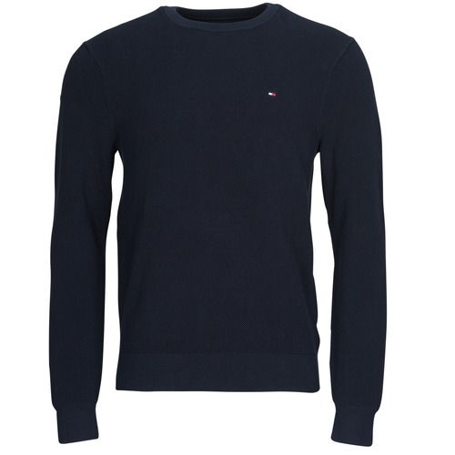 Maglione Uomo Tommy Hilfiger ESSENTIAL STRUCTURE CREW NECK Marine, elegante e versatile, ideale per outfit casual e formali. Realizzato con materiali di alta qualità, offre comfort e stile, perfetto per la stagione autunnale e invernale. Aggiungi un tocco di classe al tuo guardaroba con questo must-have firmato Tommy Hilfiger.