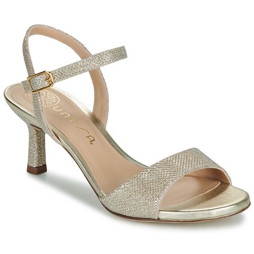 Sandali Unisa NAHIA Oro per donna, eleganti e versatili, con design contemporaneo e rifiniture di alta qualità. Ideali per completare ogni outfit estivo con stile e comfort. Perfetti per occasioni speciali o per un look casual chic. Acquista ora i sandali Unisa NAHIA Oro e aggiungi un tocco di classe al tuo guardaroba.