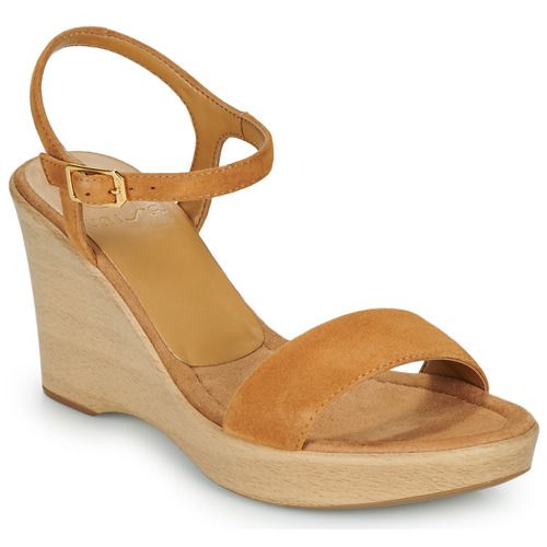 Sandali Unisa RITA Marrone per Donna: eleganti e versatili, perfetti per ogni occasione estiva. Design contemporaneo con dettagli raffinati, ideali per completare qualsiasi outfit. Acquista ora per un look alla moda e comfort senza pari.