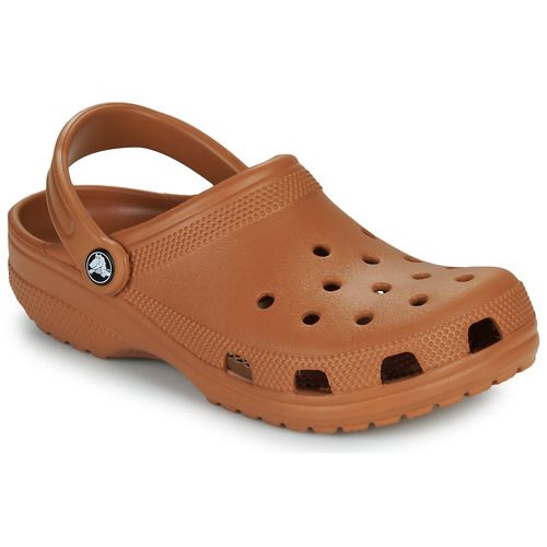 Zoccoli Uomo Crocs Classic Marrone, eleganti e confortevoli, ideali per ogni occasione. Design iconico e versatile, perfetti per casual e attività all'aperto. Materiale resistente e facile da pulire, offrono un comfort ottimale per tutta la giornata. Scarpe Crocs Classic Marrone, il must-have per un look informale e alla moda.