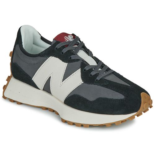 Sneakers basse New Balance 327 in color nero per donna, caratterizzate da un design moderno e alla moda, ideali per ogni occasione. Queste scarpe offrono comfort e stile, perfette per un look casual e trendy. Acquista ora le New Balance 327 e completa il tuo outfit con un tocco di eleganza!
