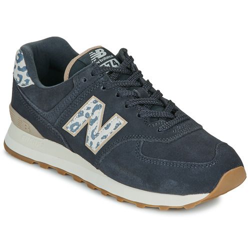 Sneakers basse New Balance 574 Nero da donna, perfette per un look casual e alla moda. Caratterizzate da una comoda suola imbottita e un design elegante, queste sneakers offrono stile e comfort per ogni occasione. Ideali per chi cerca un abbigliamento versatile e di tendenza. Acquista ora le New Balance 574 Nero e completa il tuo outfit!
