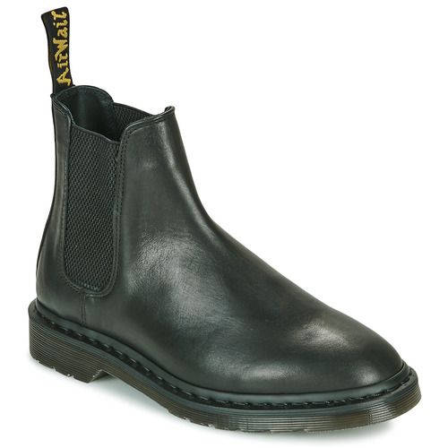 Stivaletti Donna Dr. Martens Graeme Black Classic Analine Nero, eleganti e confortevoli, perfetti per ogni occasione. Realizzati in pelle di alta qualità, questi stivali offrono un design classico e un'ottima vestibilità. Ideali per completare il tuo look con stile e praticità. Acquista ora per un tocco di moda senza tempo.