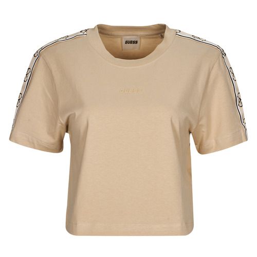 T-shirt Guess BRITNEY TOP Beige donna maniche corte, elegante e versatile, perfetta per ogni occasione. Realizzata in tessuto di alta qualità, offre comfort e stile. Ideale per look casual e chic, adatta per la primavera e l'estate. Disponibile in diverse taglie, un must-have nel tuo guardaroba.