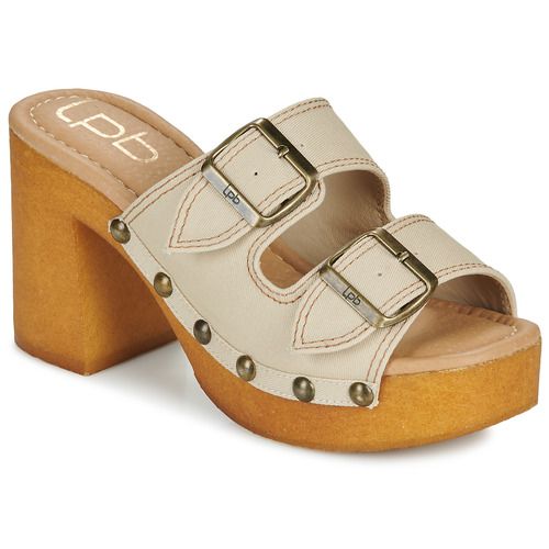 Zoccoli Donna Les Petites Bombes LETA in pelle nera con dettagli eleganti, ideali per un look casual e chic. Comodi e alla moda, questi zoccoli sono perfetti per l'estate e per ogni occasione. Acquista ora per aggiungere un tocco di stile al tuo guardaroba!