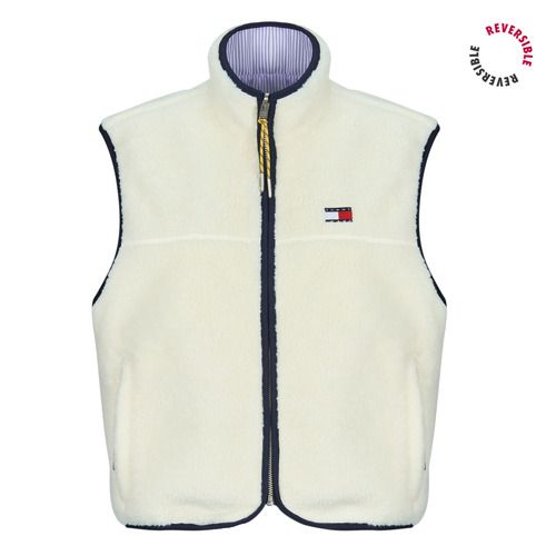 Piumino Donna Tommy Jeans TJW REVERSIBLE TEDDY VEST, giacca reversibile molto calda e elegante, realizzata in morbido tessuto teddy per un comfort ottimale. Perfetta per l'inverno, questa vest è versatile e alla moda, ideale per completare look casual e trendy. Disponibile in diverse taglie e colori, è un must-have per ogni guardaroba femminile. 