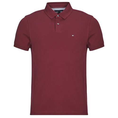 Polo uomo Tommy Hilfiger 1985 REGULAR POLO rosso, in cotone di alta qualità, con logo distintivo sul petto, ideale per un look casual e sportivo. Perfetta per ogni occasione, questa polo offre comfort e stile. Acquista ora la polo Tommy Hilfiger per un outfit sempre alla moda!