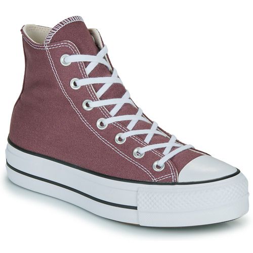 Sneakers alte Converse CHUCK TAYLOR ALL STAR LIFT PLATFORM per donna, caratterizzate da una suola plateaux per un look alla moda e confortevole. Design iconico e versatile, perfette per ogni occasione, disponibili in diverse colorazioni. Acquista ora le tue Converse originali e completa il tuo outfit con stile!