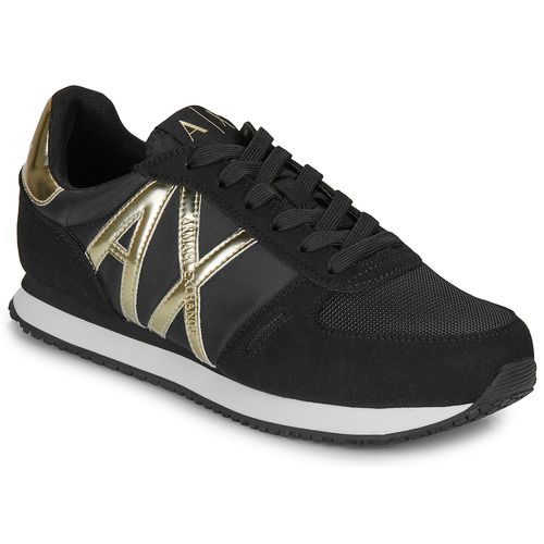 Sneakers basse Donna Armani Exchange XDX031 in color nero, con un design elegante e moderno, perfette per un look casual. Ideali per il tempo libero e le occasioni informali, queste sneakers offrono comfort e stile. Perfette da abbinare a jeans o abiti estivi, sono un must-have nel guardaroba femminile. Acquista le tue Armani Exchange XDX031 nere e fai risaltare il tuo stile!