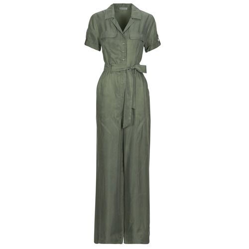 Tuta/Jumpsuit Donna Guess NALINI CUPRO in tessuto morbido e leggero, disponibile in elegante tonalità scura. Design alla moda con scollo a V e maniche corte, perfetta per occasioni casual ed eleganti. Ideale per un look giovane e trendy, da abbinare con sandali o tacchi per ogni stagione. Acquista ora la tuta Guess NALINI CUPRO per un guardaroba versatile e stiloso.