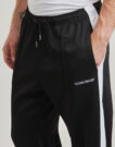Pantaloni Sportivi Guess TRICOT TRACK PANT Nero Pantaloni Sportivi Uomo - 5
