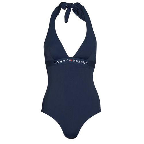 Costume intero donna Tommy Hilfiger HALTER ONE PIECE (EXT SIZES) Marine, eleganza e comfort per la stagione estiva. Design alla moda in tonalità marine, ideale per la spiaggia o la piscina. Realizzato con materiali di alta qualità per una vestibilità perfetta e supporto. Perfetto per donne di tutte le taglie, questo costume ti fara sentire sicura e alla moda. Compra subito e rendi il tuo look estivo indimenticabile!