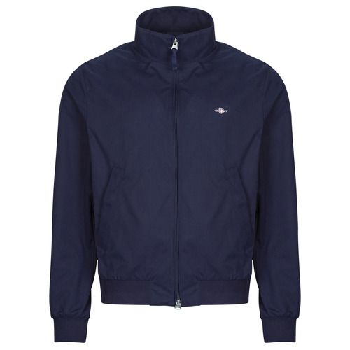 Giubbotto uomo Gant LIGHTWEIGHT HAMPSHIRE JACKET Marine, elegante e versatile, ideale per la stagione autunnale. Realizzato con materiali leggeri e resistenti, offre comfort e stile per ogni occasione. Perfetto per un look casual o sportivo, il giubbotto Gant è un must-have nel guardaroba maschile. Scopri il tuo nuovo alleato di moda per affrontare il freddo con classe.