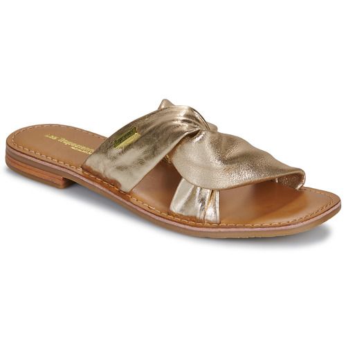 Ciabatta Donna Les Tropéziennes par M Belarbi HIROK in Oro, elegante e versatile, ideale per l'estate. Comoda e alla moda, perfetta per ogni occasione. Scopri il comfort e lo stile di queste ciabatte uniche.