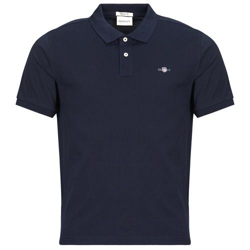 Polo Uomo Gant REG SHIELD SS PIQUE in colore Marine, realizzata in tessuto di alta qualità per un comfort quotidiano. Design elegante e versatile, ideale per abbinamenti casual e formali. Scopri la qualità Gant e acquista la tua polo perfetta per un look sempre alla moda.