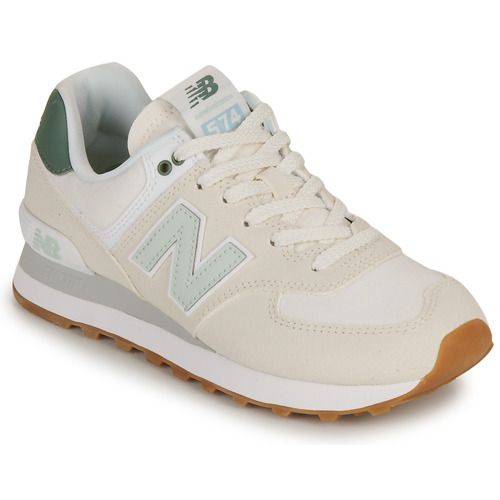Sneakers basse New Balance 574 Beige per donna, perfette per un look casual e alla moda. Queste eleganti scarpe sportive offrono comfort e stile, ideali per ogni occasione. Acquista ora le New Balance 574 Beige e completa il tuo outfit con un tocco di classe.
