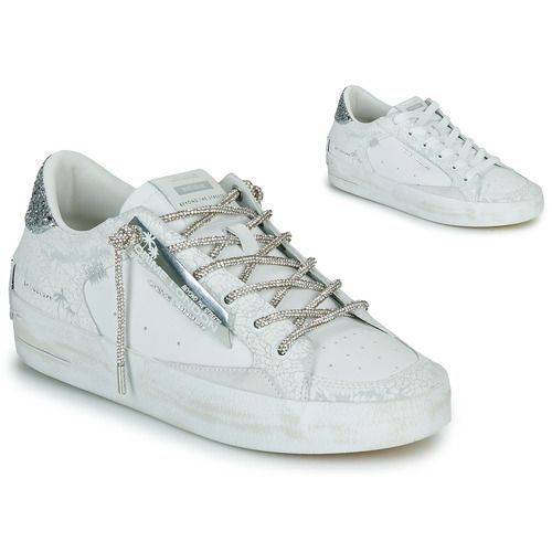 Sneakers basse Crime London SK8 DELUXE Bianco per donna, eleganti e versatili, perfette per ogni occasione. Design moderno e materiali di alta qualità, ideali per un look casual e alla moda. Acquista ora le tue nuove sneakers comfortable e trendy!