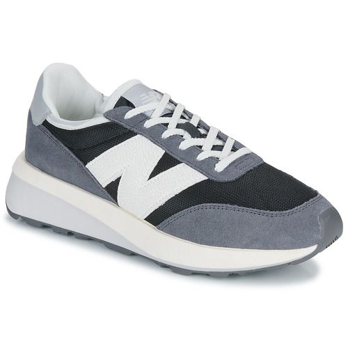 Sneakers uomo New Balance 370 in nero, design elegante e moderno, ideali per il quotidiano e per il tempo libero. Comode e versatili, ottime per abbinamenti casual. Acquista ora le New Balance 370 nere per un look alla moda e comfort senza pari.