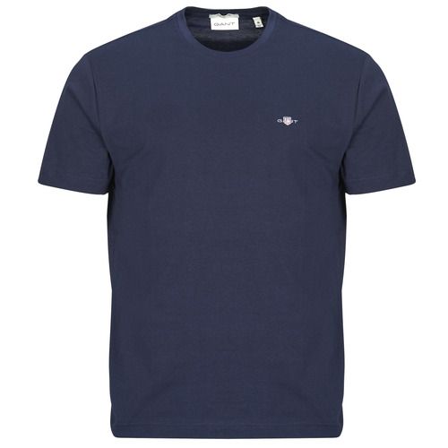 T-shirt uomo Gant REG SHIELD SS T-SHIRT Marine, elegante t-shirt maniche corte in colore navy, realizzata con materiali di alta qualità per comfort e stile. Perfetta per look casual e sportivi, ideale per la stagione estiva. Acquista ora il tuo nuovo must-have per il guardaroba maschile.
