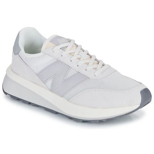 "New Balance 370 Sneakers basse Donna, eleganti e confortevoli, ideali per il tempo libero e l'abbigliamento casual. Design moderno e materiali di alta qualità per un look versatile. Disponibili in diverse combinazioni di colori."