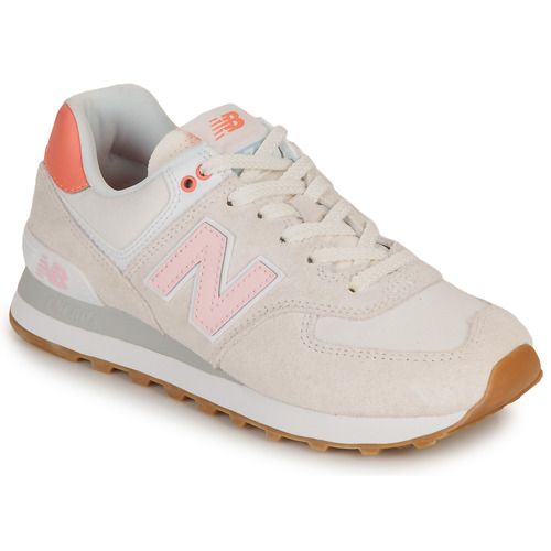 Sneakers basse New Balance 574 da donna in colore grigio, con design elegante e materiale traspirante, ideali per il comfort quotidiano e lo stile. Perfette per sport e tempo libero, queste scarpe offrono una suola ammortizzata e una vestibilità ottimale. Acquista ora le New Balance 574 Sneakers basse Donna per elevare il tuo look casual.