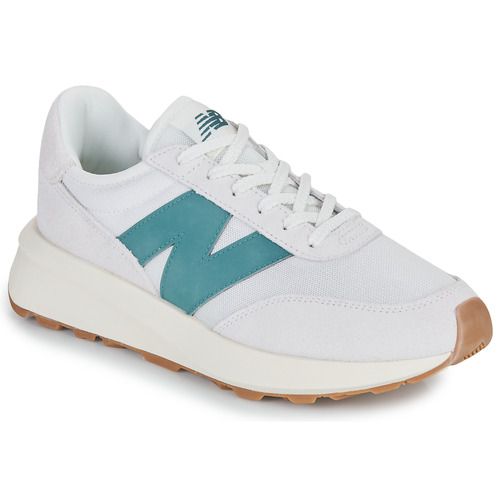 Sneakers uomo New Balance 370 beige, confort e stile per ogni occasione. Scopri il design elegante e la qualità premium di queste scarpe, perfette per un look casual e moderno. Acquista ora le New Balance 370 beige e dai un tocco distintivo al tuo outfit.