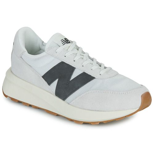 Sneakers uomo New Balance 370 Beige, eleganti e comode, ideali per ogni occasione. Scarpe sportive di alta qualità, perfette per il tempo libero e il fitness. Acquista le New Balance 370 Beige per un look moderno e casual.