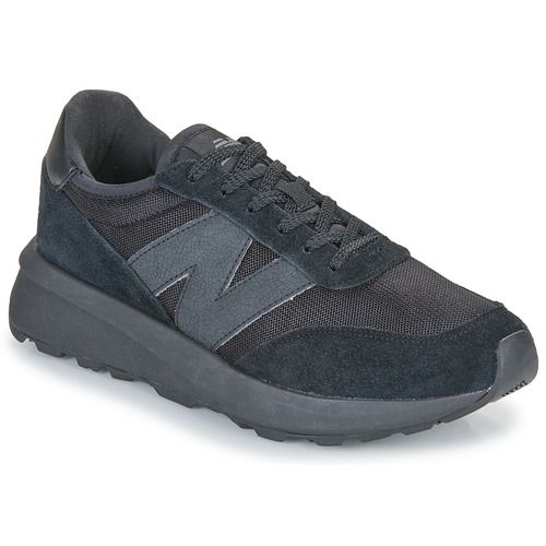 Sneakers uomo New Balance 370 in nero, un modello elegante e versatile perfetto per ogni occasione. Realizzate con materiali di alta qualità per garantire comfort e durata, queste scarpe sportive offrono un design moderno e un ottimo supporto per il piede. Acquista le New Balance 370 nere per un look alla moda e dinamico. Ideali per il tempo libero e l'attività fisica, rappresentano un must-have nel tuo guardaroba.