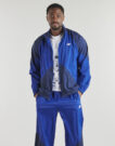 Veste de sport New Balance SPORT LEGACY bleue pour homme - Taille 2